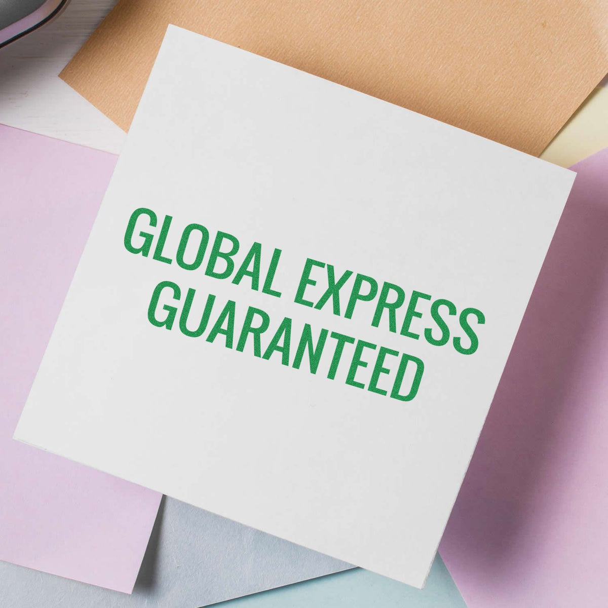 Large Pre-Inked Global Express Guaranteed Stamp In Use