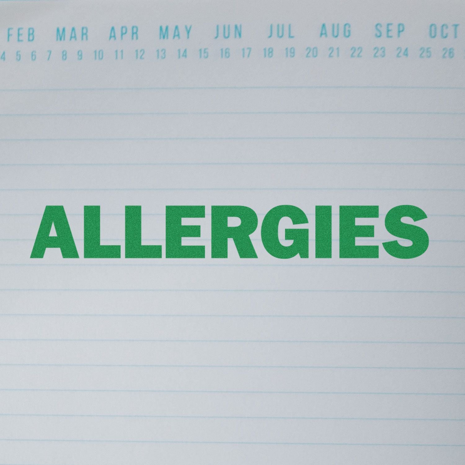 Large Pre-Inked Allergies Stamp in green ink on a lined paper with months of the year listed at the top.