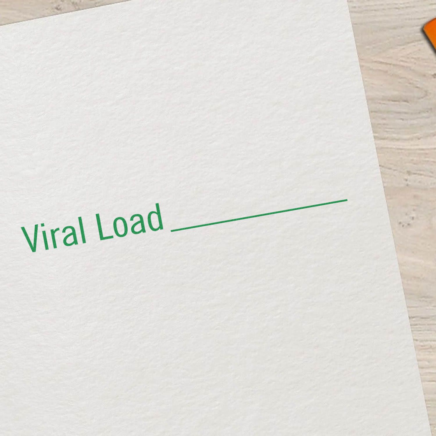 Large Self Inking Viral Load Stamp on white paper with green text Viral Load and a blank line for writing.