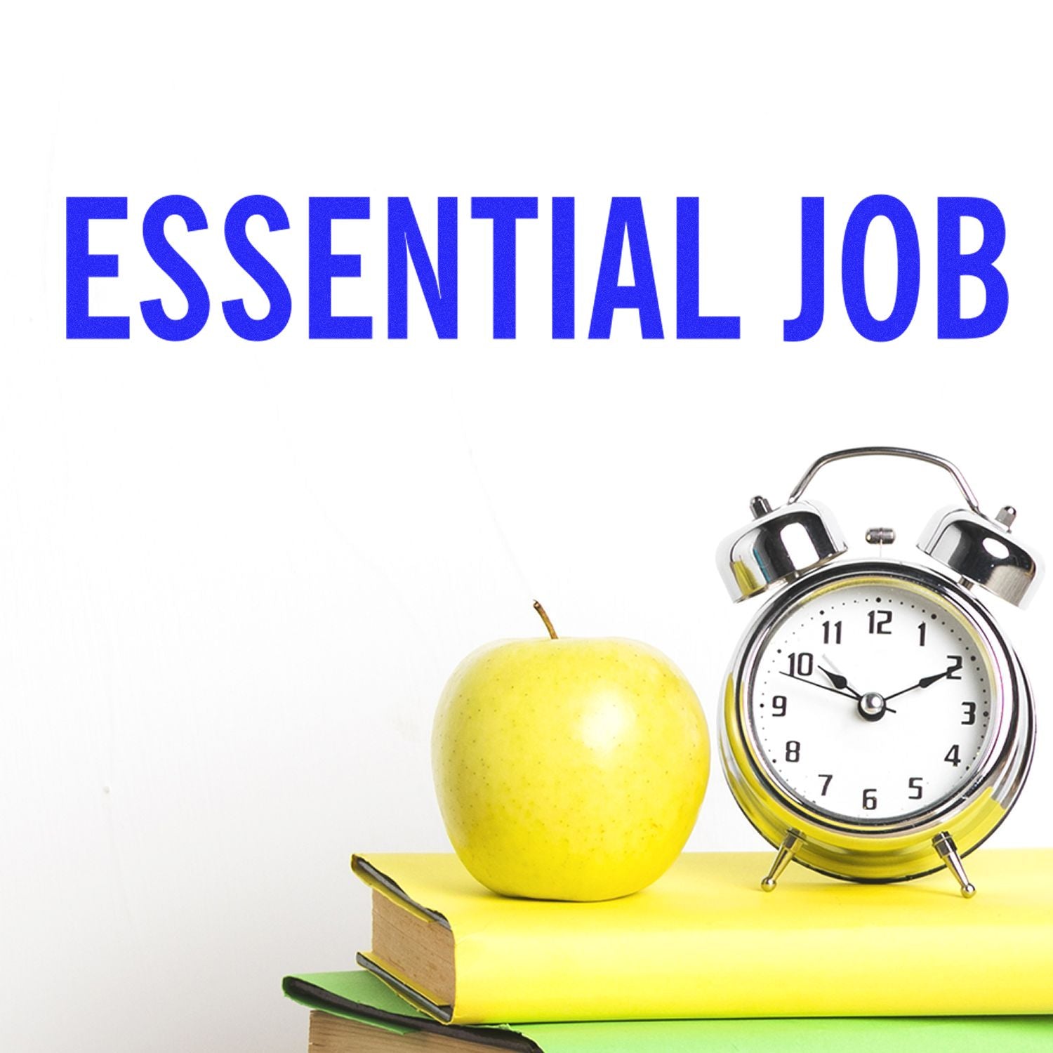 Image of a Large Self Inking Essential Job Stamp with an apple, clock, and books in the background, emphasizing the importance of essential jobs.