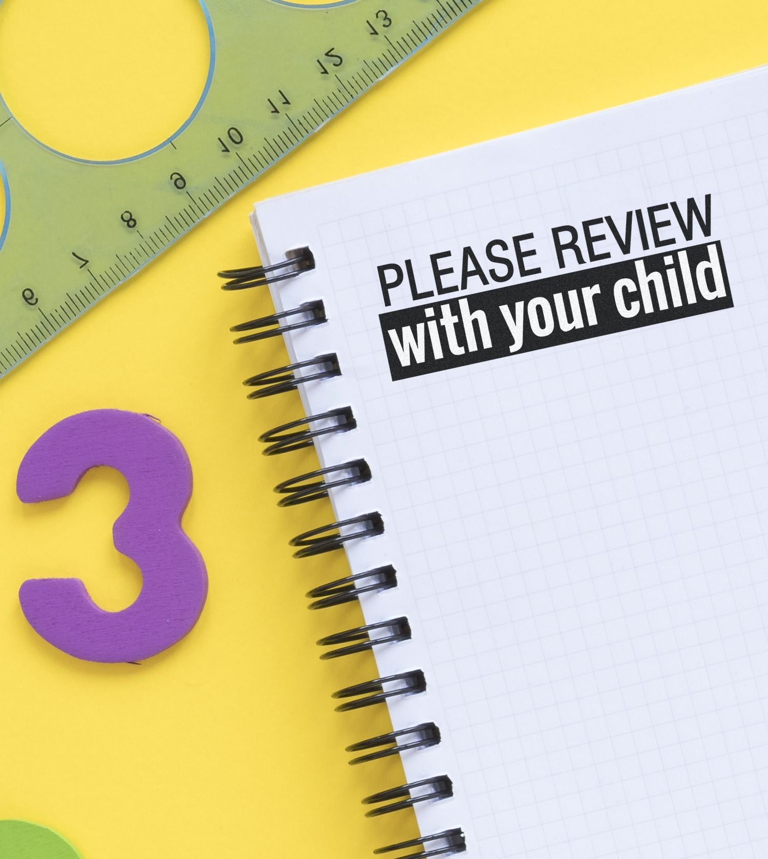 Large Pre-Inked Please Review With Your Child Stamp on a notebook, with a ruler, stencil, and purple number 3 on a yellow background.