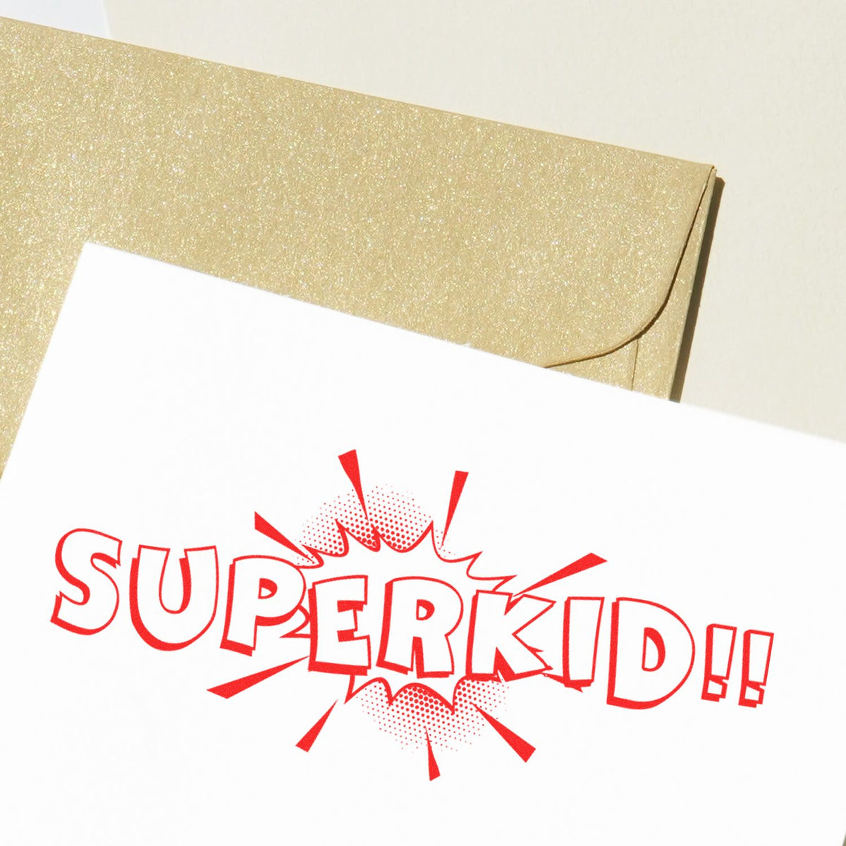 Large Pre-Inked Superkid Stamp In Use Photo