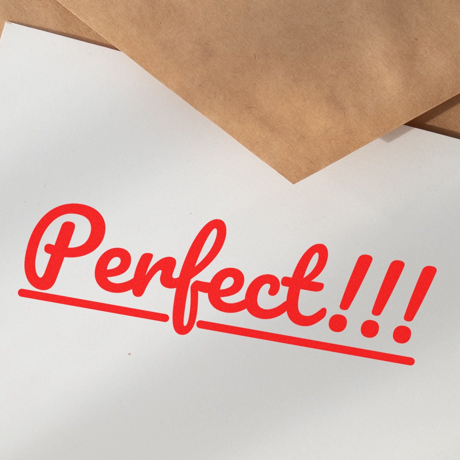 Large Pre-Inked Perfect Stamp in red ink on white paper with brown envelopes in the background. The stamp reads Perfect!!!