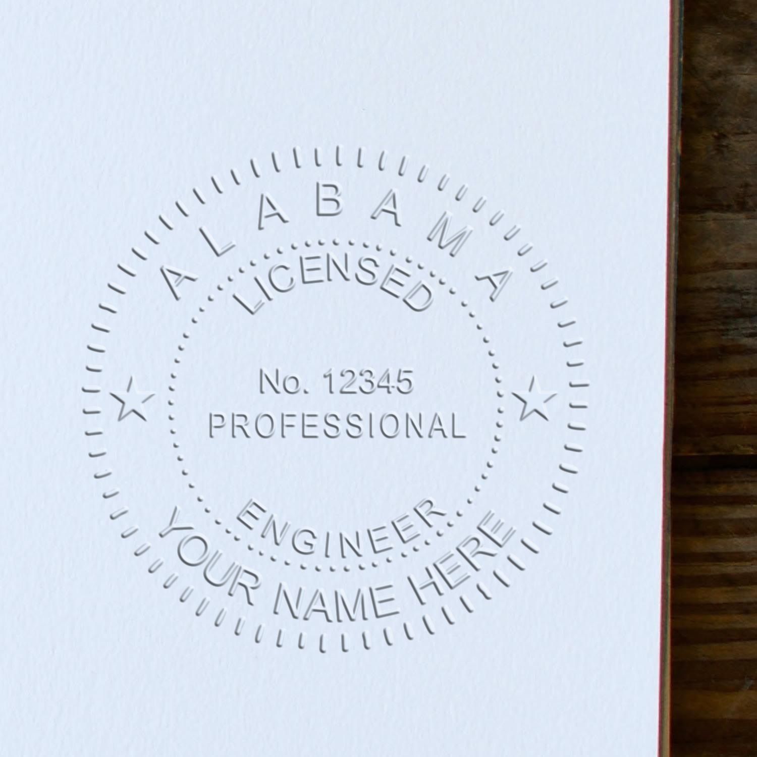 The Heavy Duty Cast Iron Alabama Engineer Seal Embosser stamp impression comes to life with a crisp, detailed photo on paper - showcasing true professional quality.