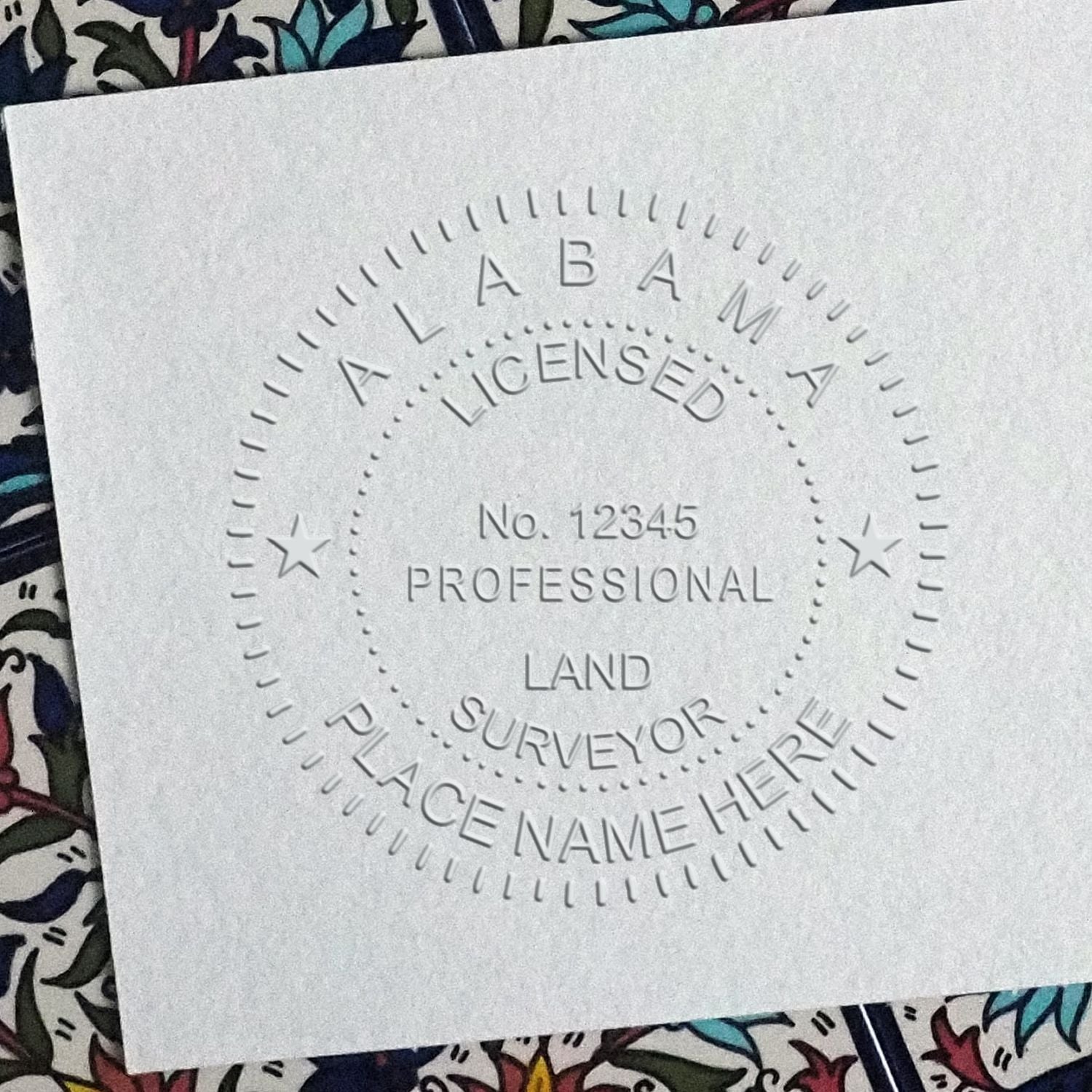 A stamped impression of the Long Reach Alabama Land Surveyor Seal in this stylish lifestyle photo, setting the tone for a unique and personalized product.