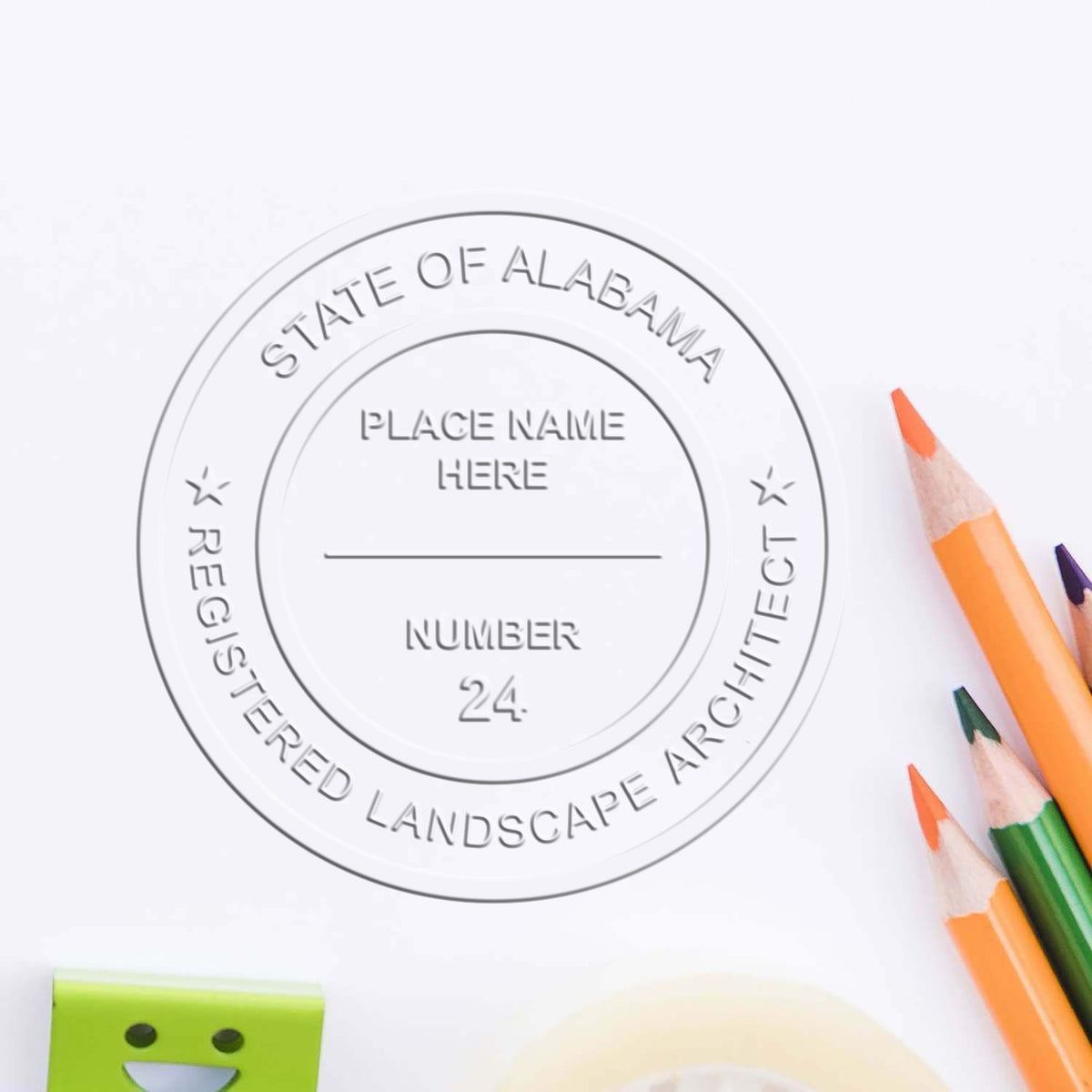 An in use photo of the Hybrid Alabama Landscape Architect Seal showing a sample imprint on a cardstock