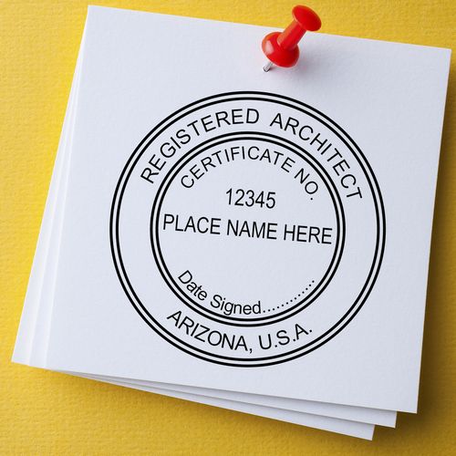 A lifestyle photo showing a stamped image of the Slim Pre-Inked Arizona Architect Seal Stamp on a piece of paper