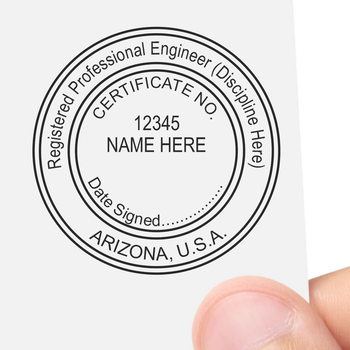 A lifestyle photo showing a stamped image of the Slim Pre-Inked Arizona Professional Engineer Seal Stamp on a piece of paper