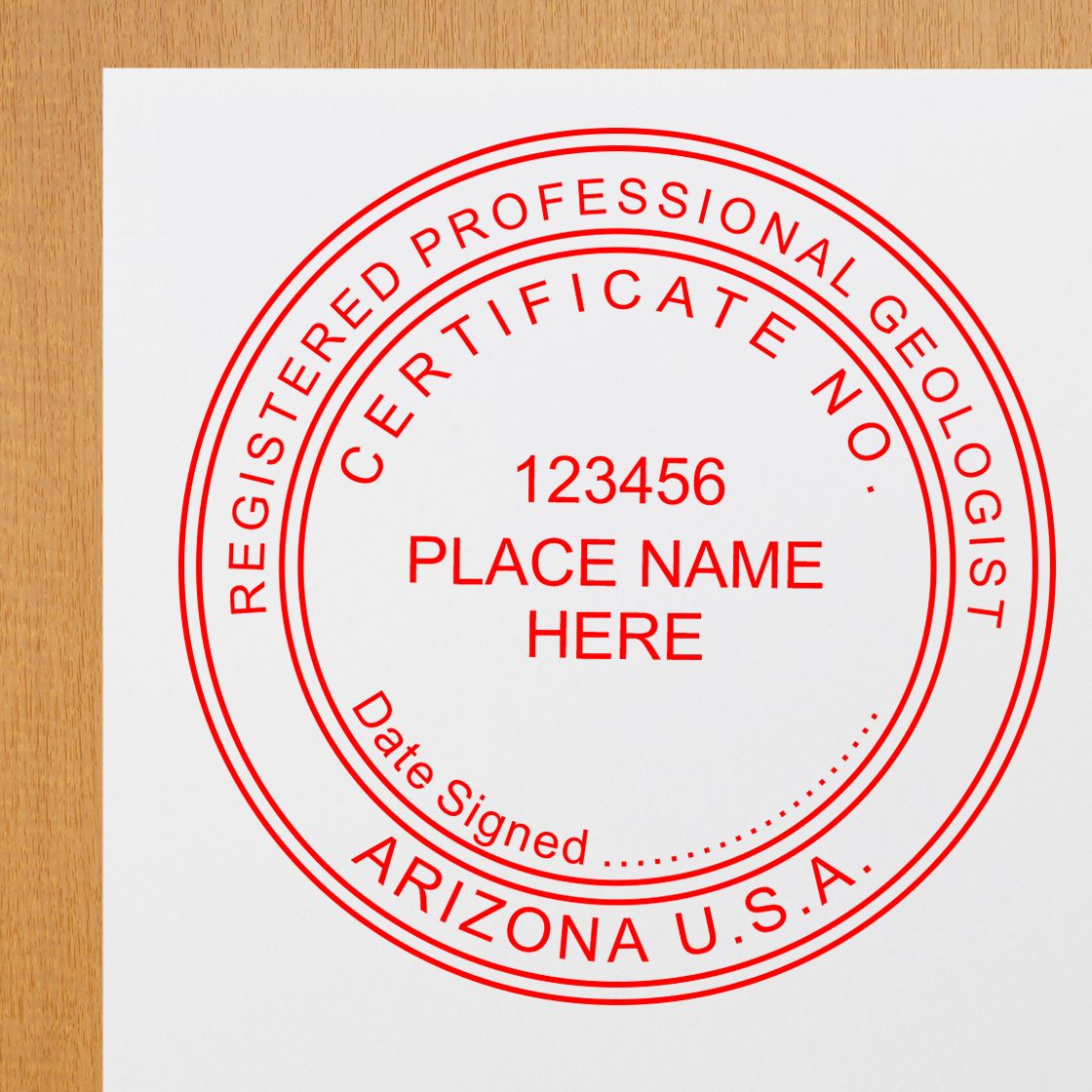 A lifestyle photo showing a stamped image of the Arizona Professional Geologist Seal Stamp on a piece of paper