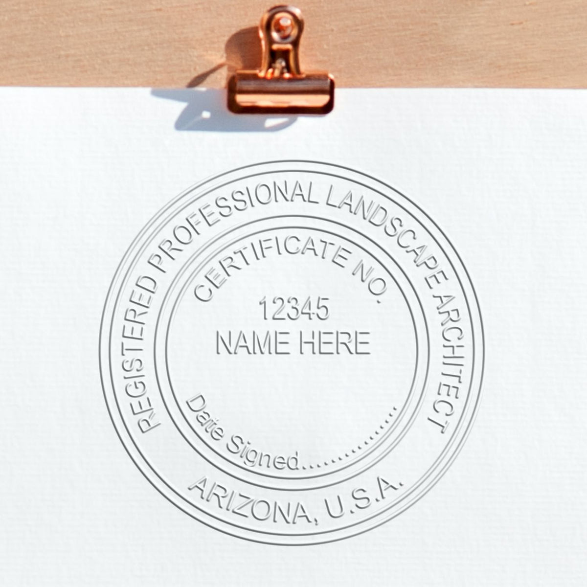 A photograph of the Hybrid Arizona Landscape Architect Seal stamp impression reveals a vivid, professional image of the on paper.