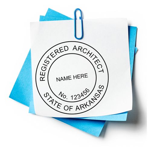 A lifestyle photo showing a stamped image of the Slim Pre-Inked Arkansas Architect Seal Stamp on a piece of paper
