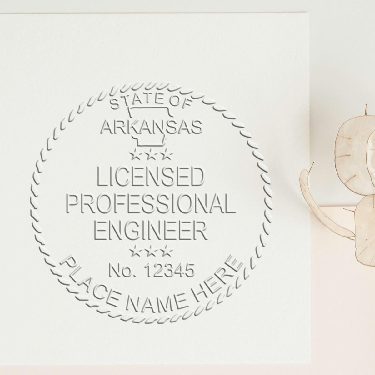 A stamped impression of the Arkansas Engineer Desk Seal in this stylish lifestyle photo, setting the tone for a unique and personalized product.