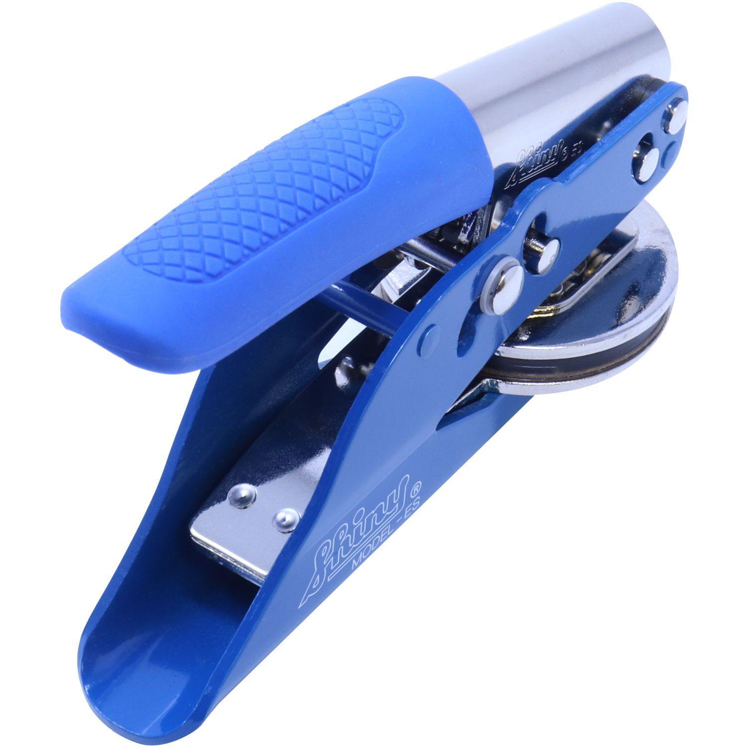 Public Weighmaster Blue Soft Seal Handheld Embosser with a blue handle and metal components, angled back side view.