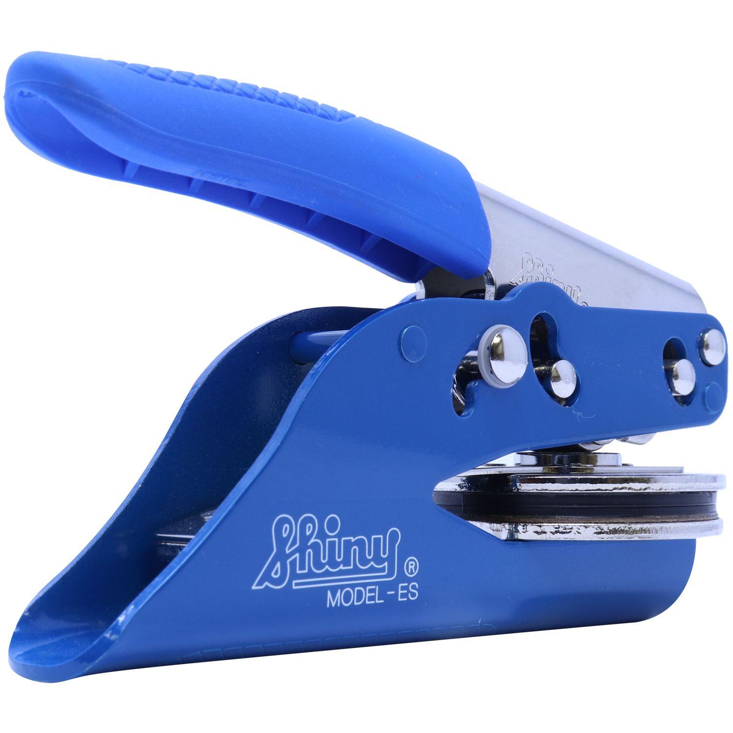 Land Surveyor Blue Soft Seal Embosser with a blue handle and metal components, designed for creating embossed imprints, side view.