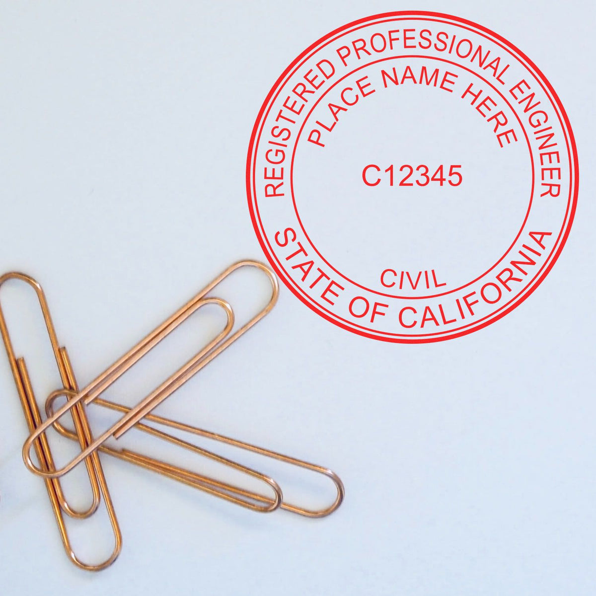 A lifestyle photo showing a stamped image of the California Professional Engineer Seal Stamp on a piece of paper