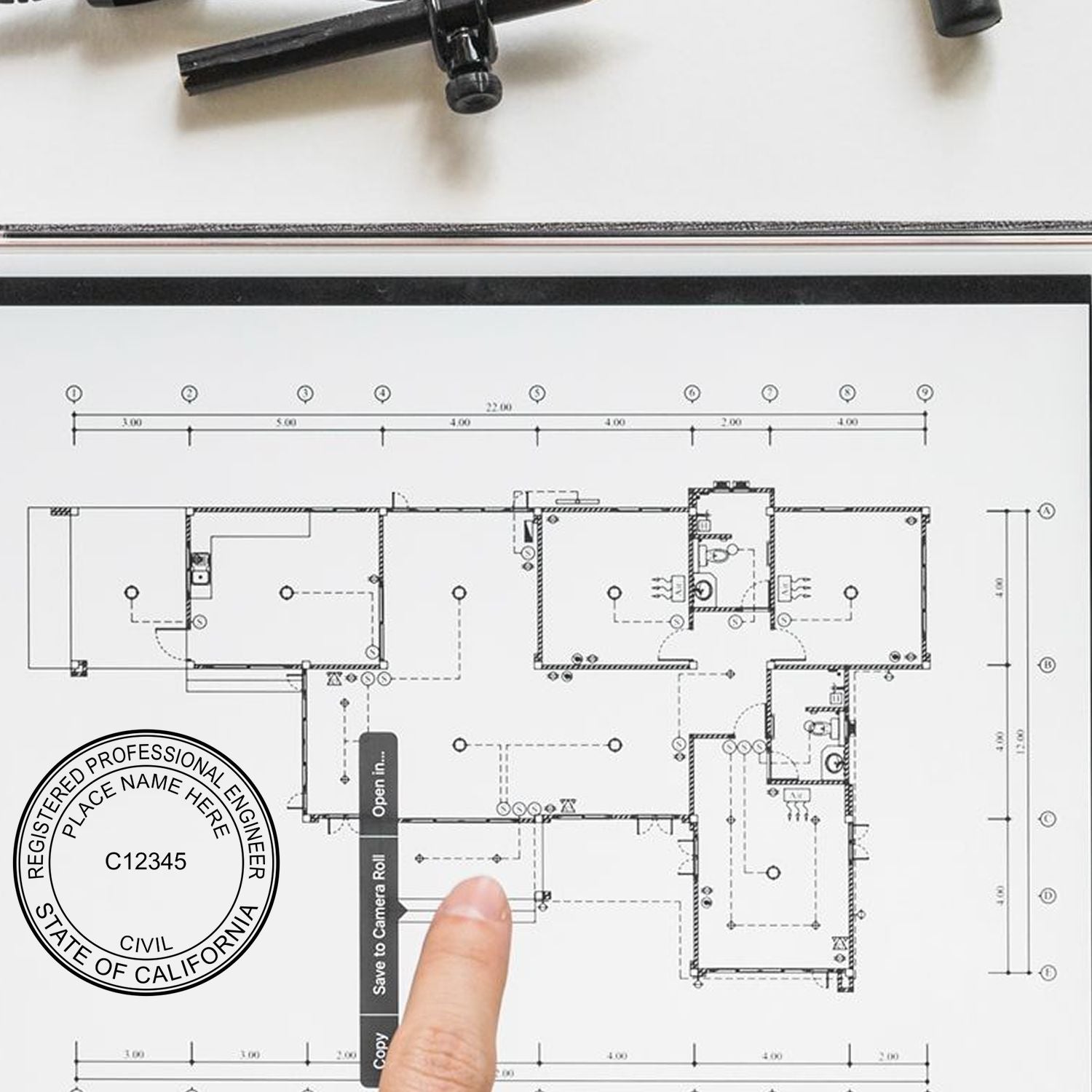 This paper is stamped with a sample imprint of the Digital California PE Stamp and Electronic Seal for California Engineer, signifying its quality and reliability.