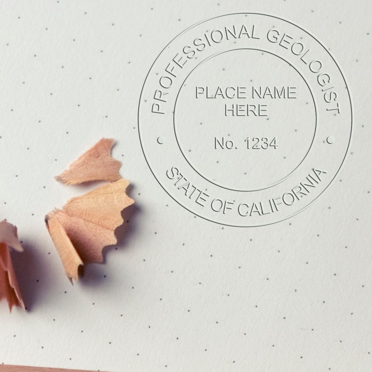 An in use photo of the Hybrid California Geologist Seal showing a sample imprint on a cardstock