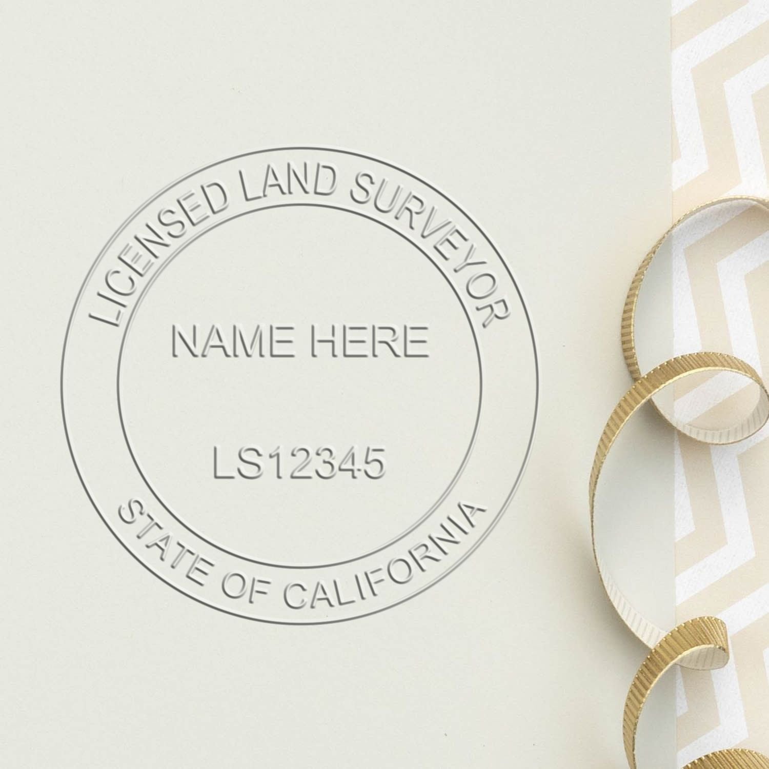 An in use photo of the Hybrid California Land Surveyor Seal showing a sample imprint on a cardstock