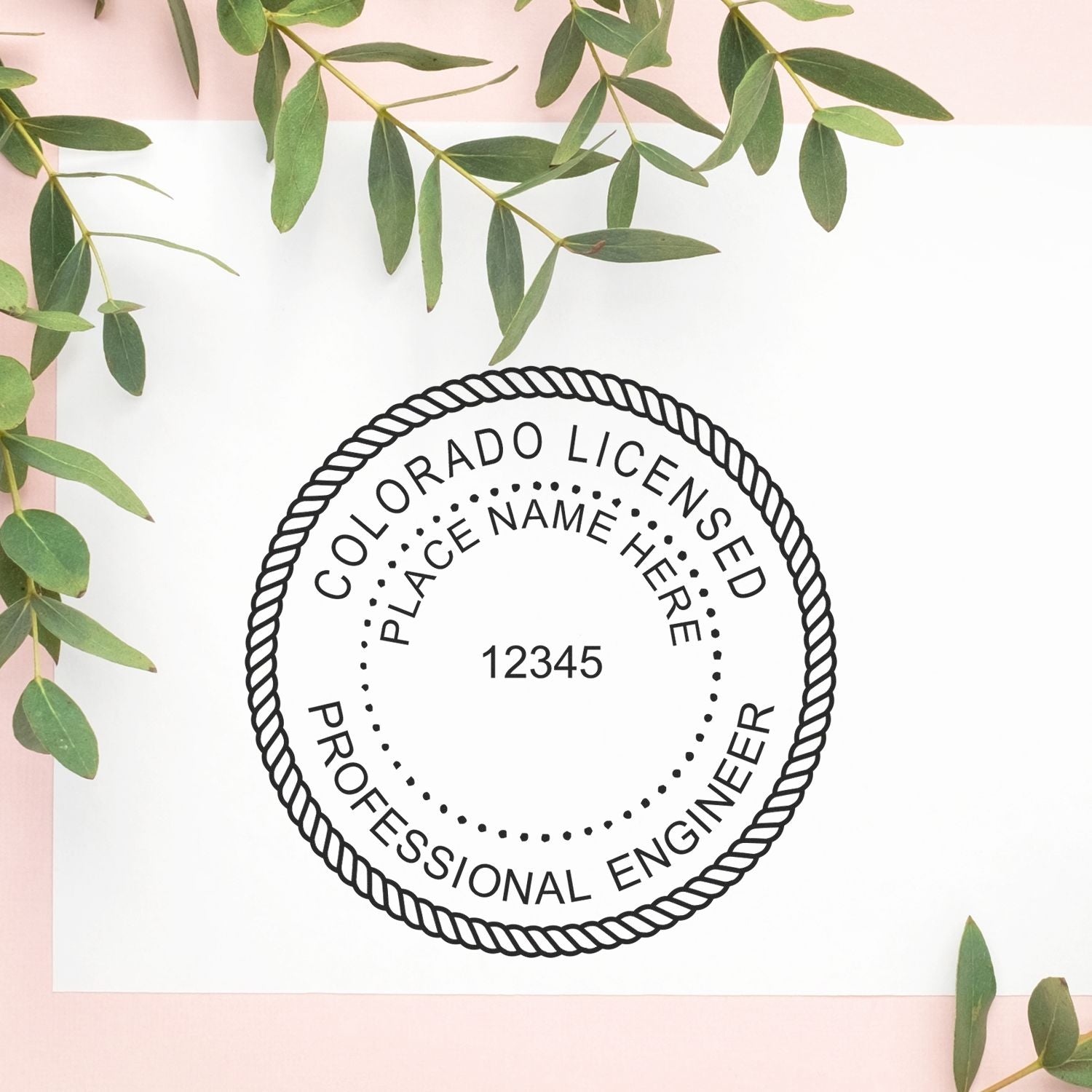 A stamped impression of the Premium MaxLight Pre-Inked Colorado Engineering Stamp in this stylish lifestyle photo, setting the tone for a unique and personalized product.