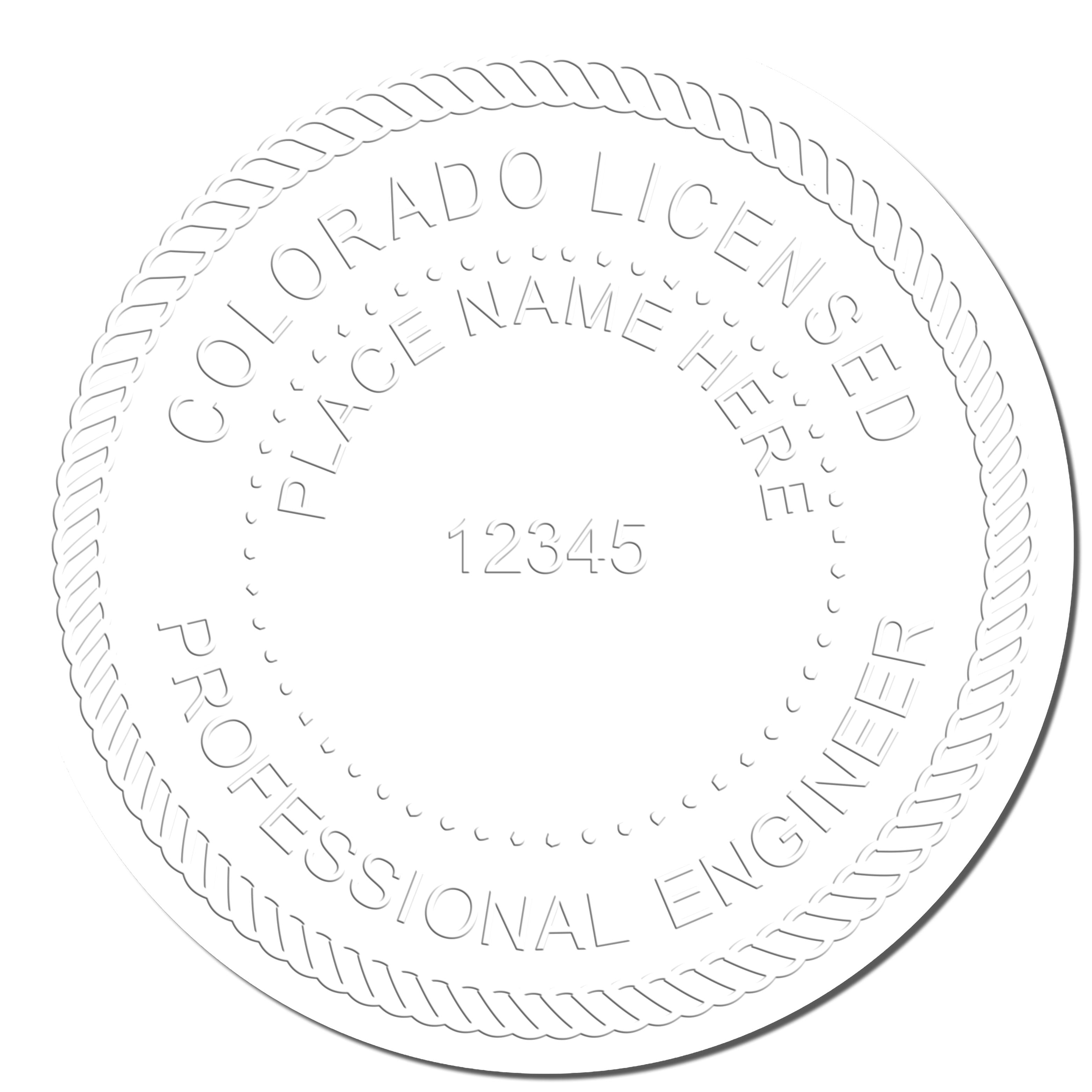 A photograph of the Handheld Colorado Professional Engineer Embosser stamp impression reveals a vivid, professional image of the on paper.