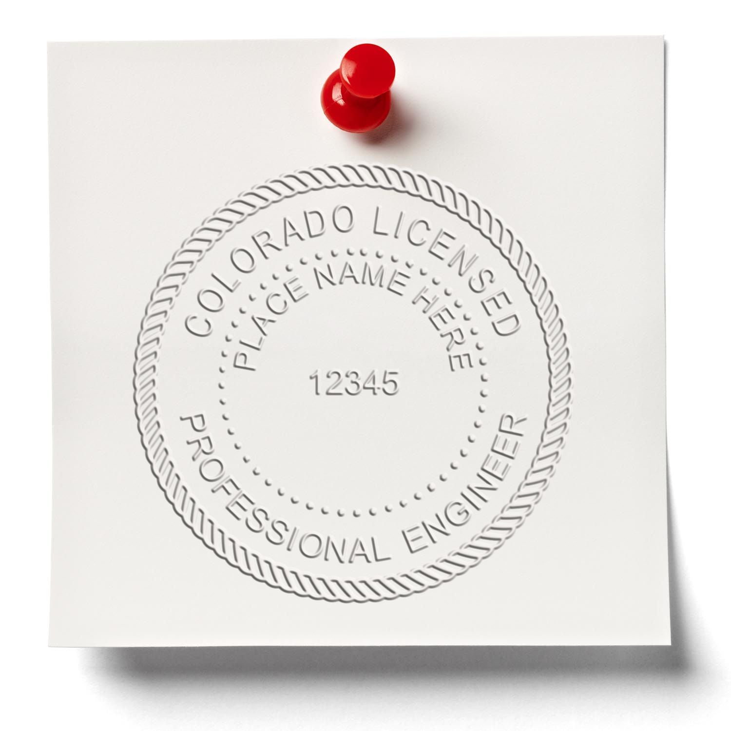 The State of Colorado Extended Long Reach Engineer Seal stamp impression comes to life with a crisp, detailed photo on paper - showcasing true professional quality.