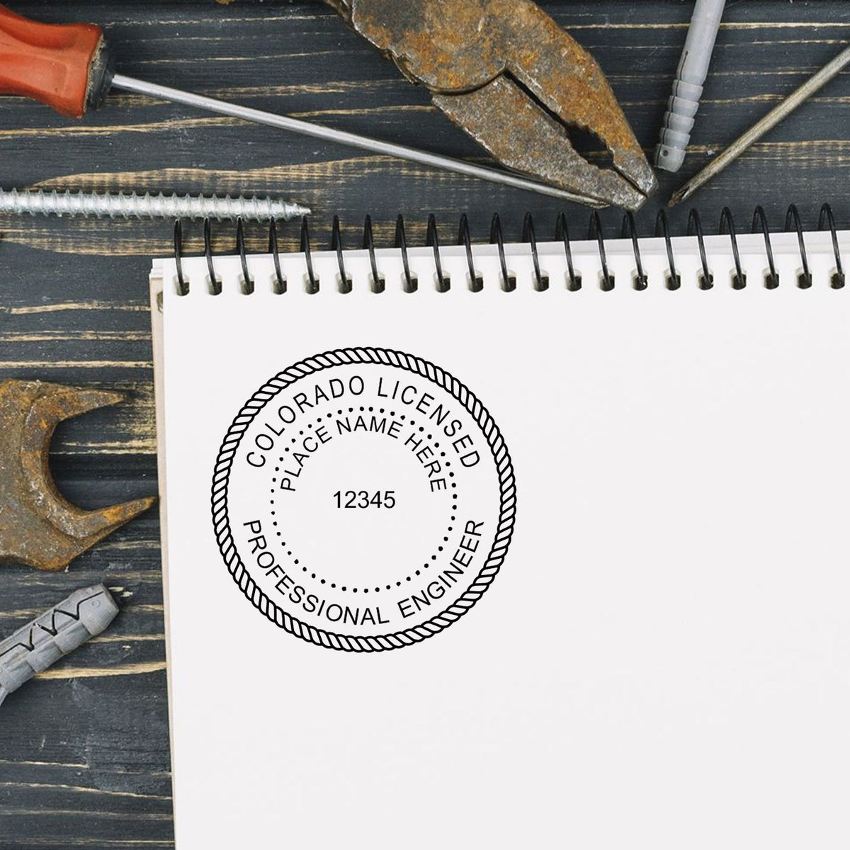 A photograph of the Colorado Professional Engineer Seal Stamp stamp impression reveals a vivid, professional image of the on paper.