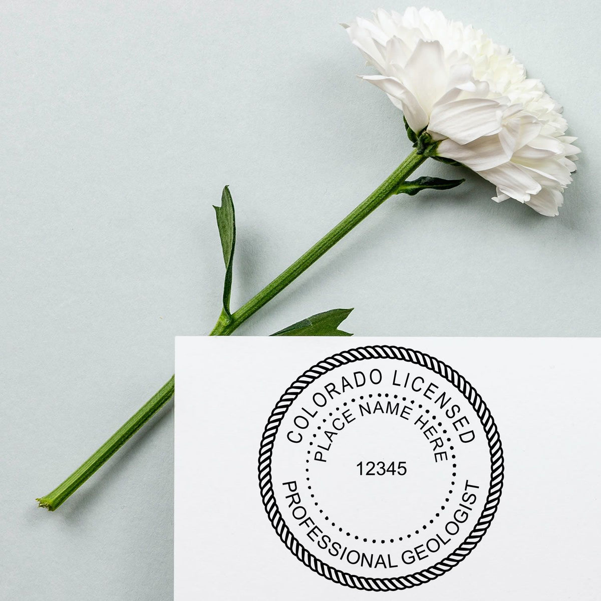 A stamped imprint of the Digital Colorado Geologist Stamp, Electronic Seal for Colorado Geologist in this stylish lifestyle photo, setting the tone for a unique and personalized product.