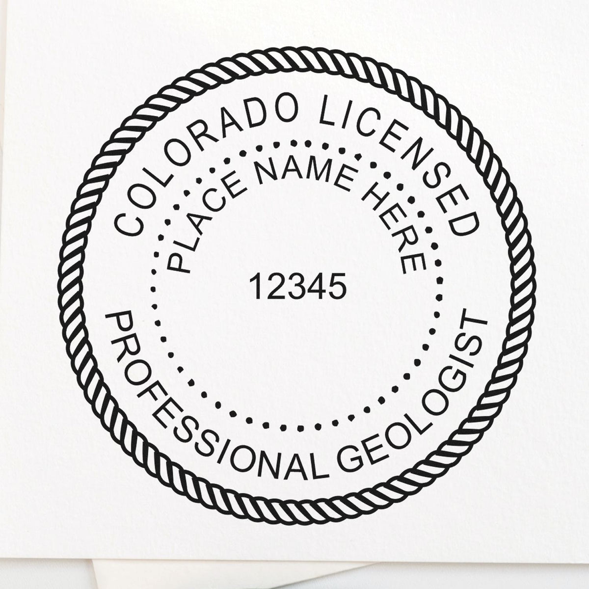 A photograph of the Slim Pre-Inked Colorado Professional Geologist Seal Stamp  impression reveals a vivid, professional image of the on paper.