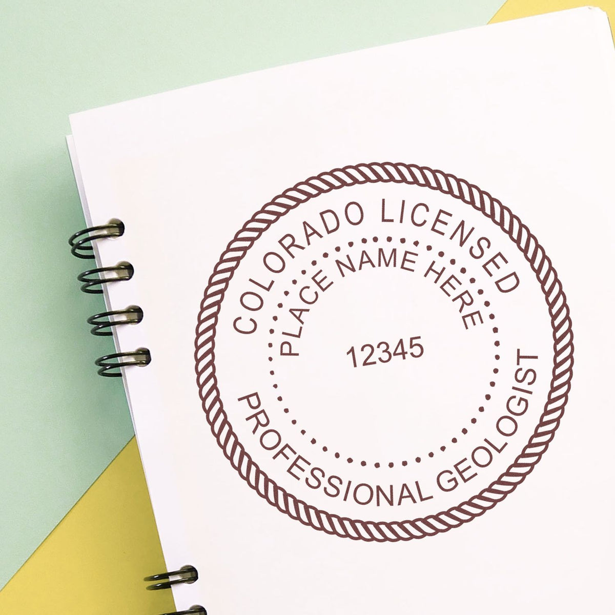 The Self-Inking Colorado Geologist Stamp stamp impression comes to life with a crisp, detailed image stamped on paper - showcasing true professional quality.