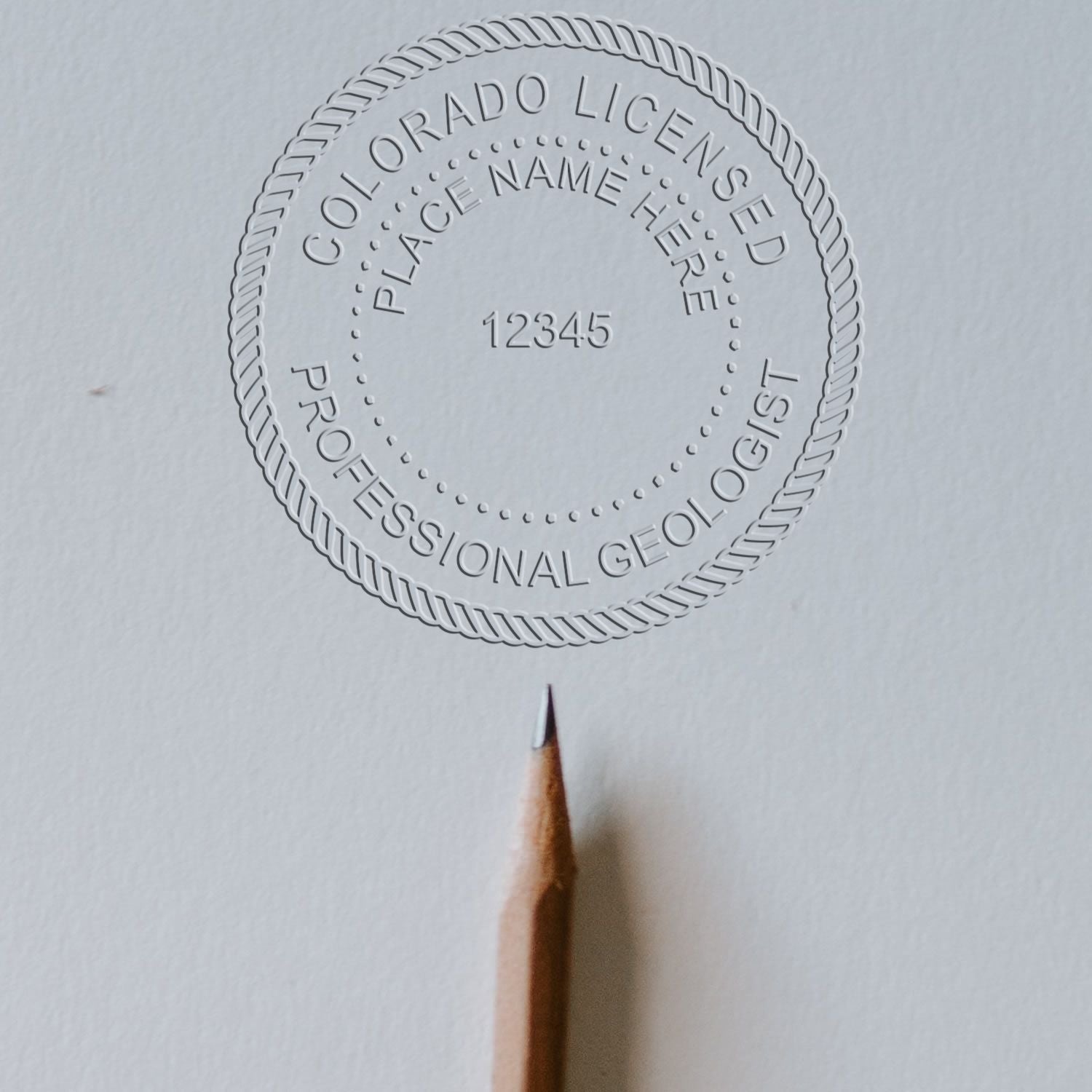 The main image for the Long Reach Colorado Geology Seal depicting a sample of the imprint and imprint sample
