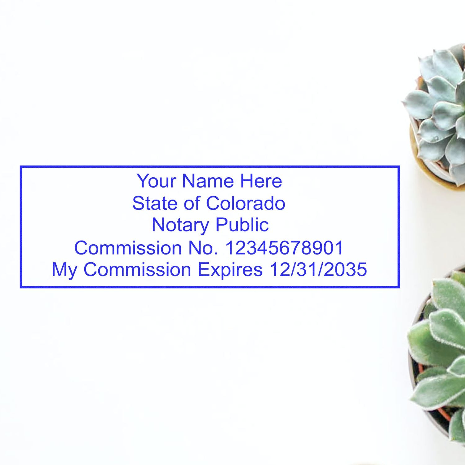 A lifestyle photo showing a stamped image of the Colorado Rectangular Digital Notary Seal on a piece of paper