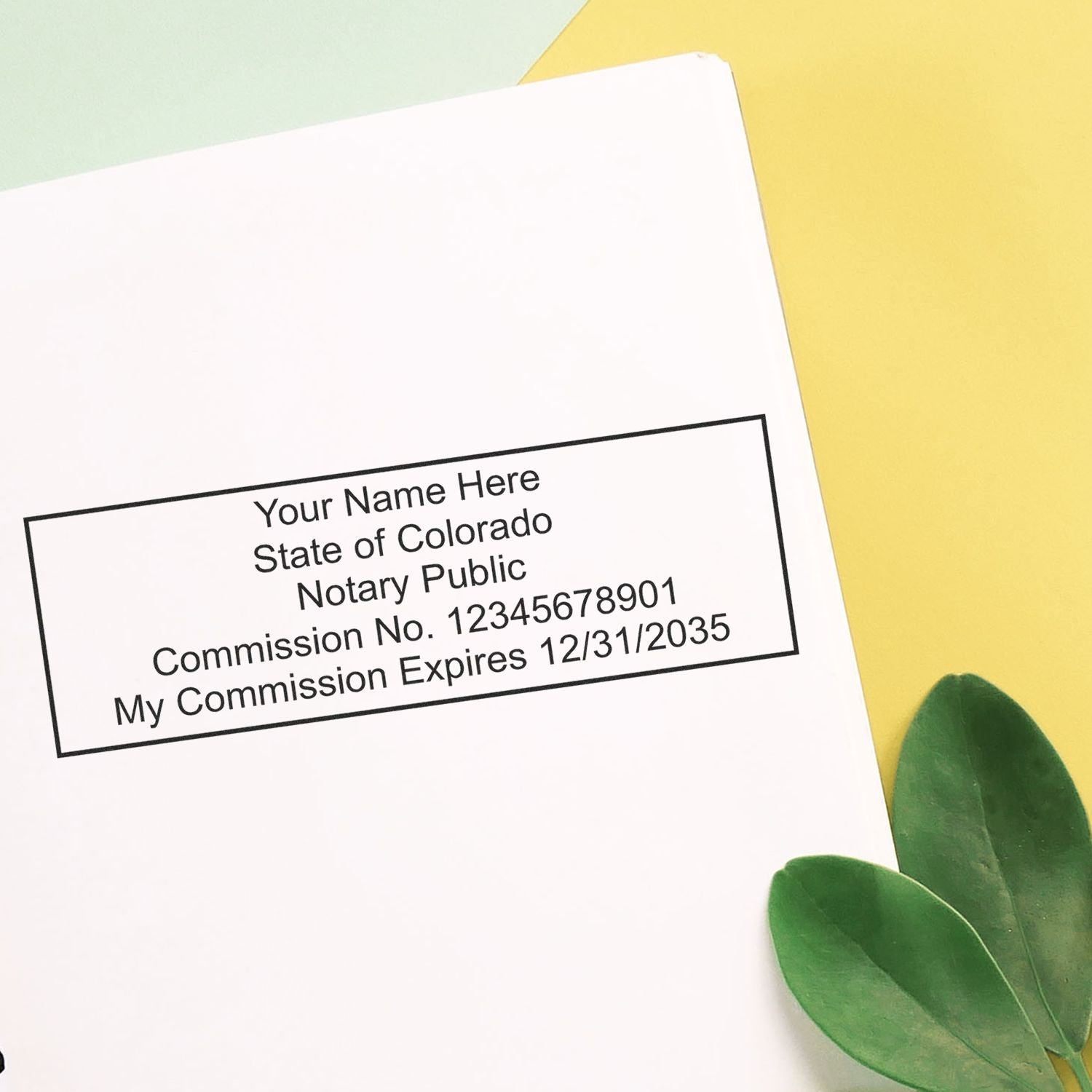 A photograph of the Colorado Rectangular Digital Notary Seal stamp impression reveals a vivid, professional image of the on paper.