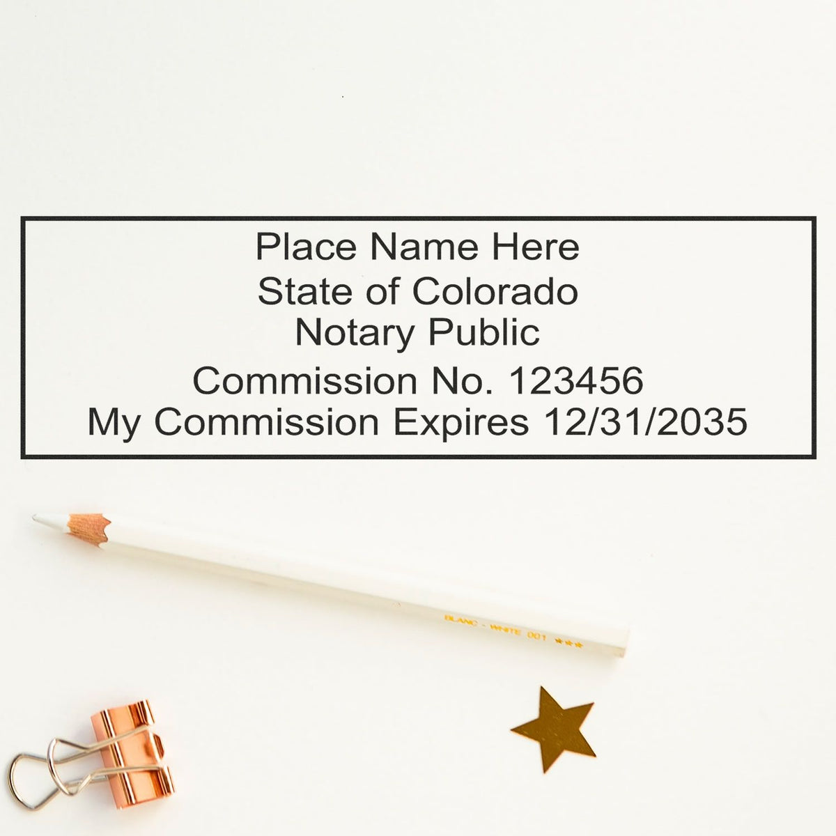 A stamped impression of the Slim Pre-Inked Rectangular Notary Stamp for Colorado in this stylish lifestyle photo, setting the tone for a unique and personalized product.