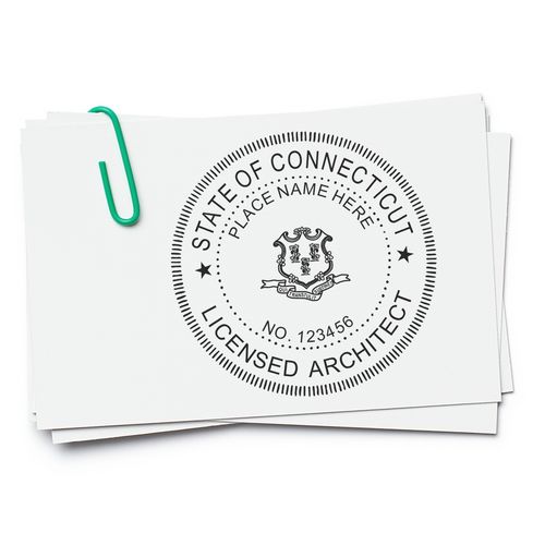 A lifestyle photo showing a stamped image of the Slim Pre-Inked Connecticut Architect Seal Stamp on a piece of paper