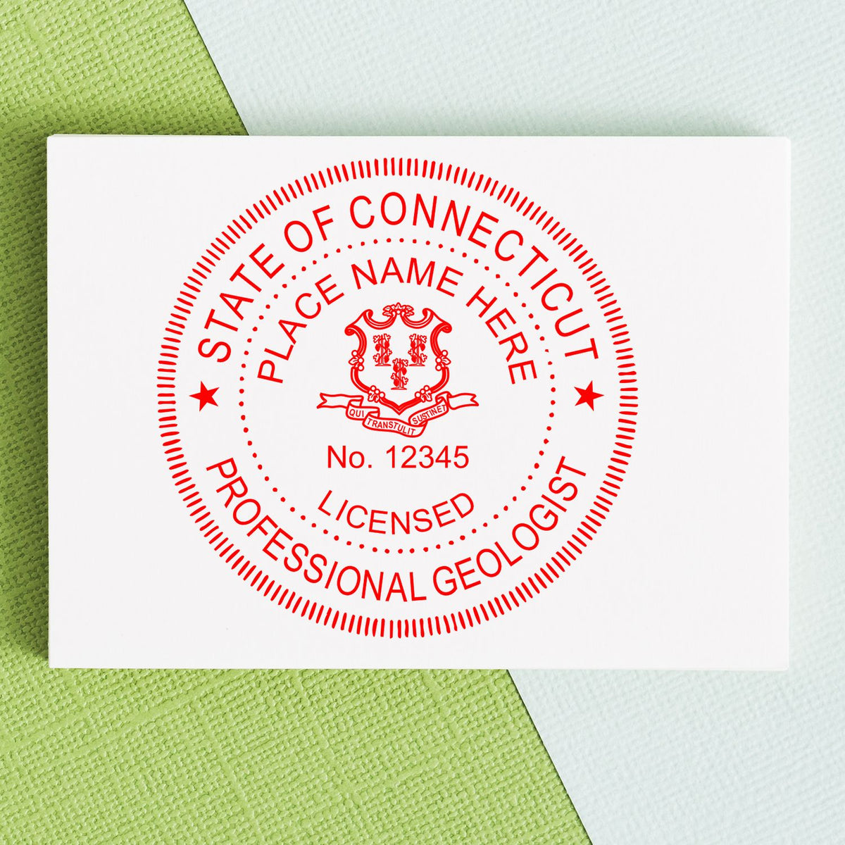 A lifestyle photo showing a stamped image of the Connecticut Professional Geologist Seal Stamp on a piece of paper