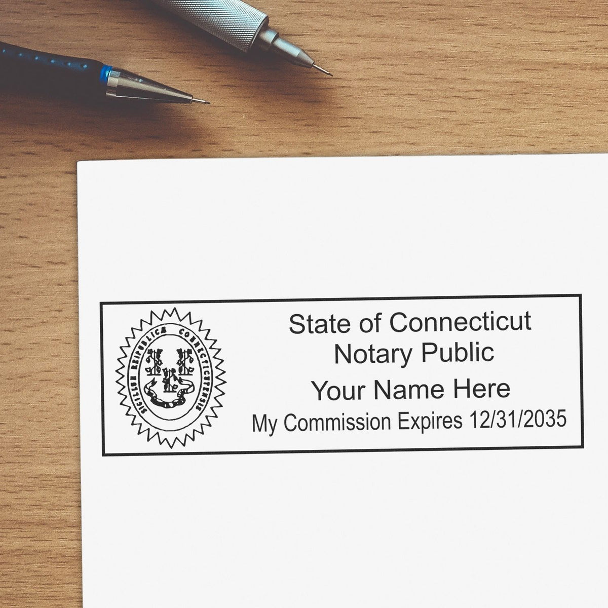 A lifestyle photo showing a stamped image of the Heavy-Duty Connecticut Rectangular Notary Stamp on a piece of paper