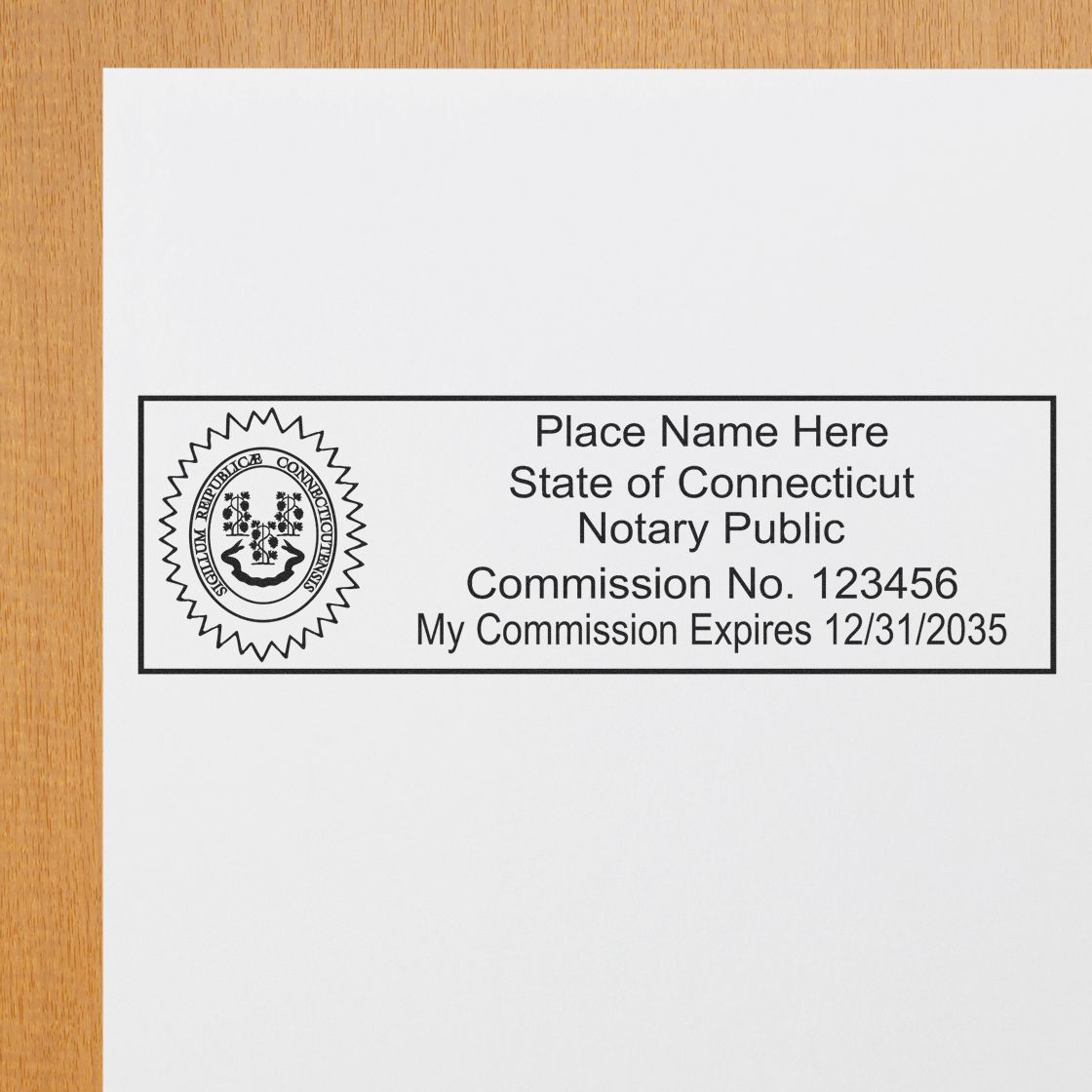 A photograph of the Wooden Handle Connecticut State Seal Notary Public Stamp stamp impression reveals a vivid, professional image of the on paper.