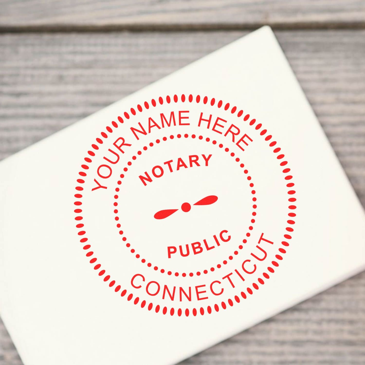 Heavy-Duty Round Connecticut Notary Stamp in use photo showing a stamped imprint of the Heavy-Duty Round Connecticut Notary Stamp