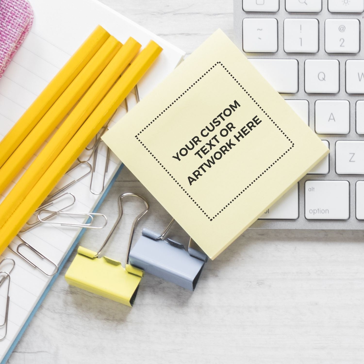 Custom Self Inking Stamp Trodat 4924 Size 1-5/8 x 1-5/8 on a desk with pencils, paper clips, binder clips, and a keyboard.