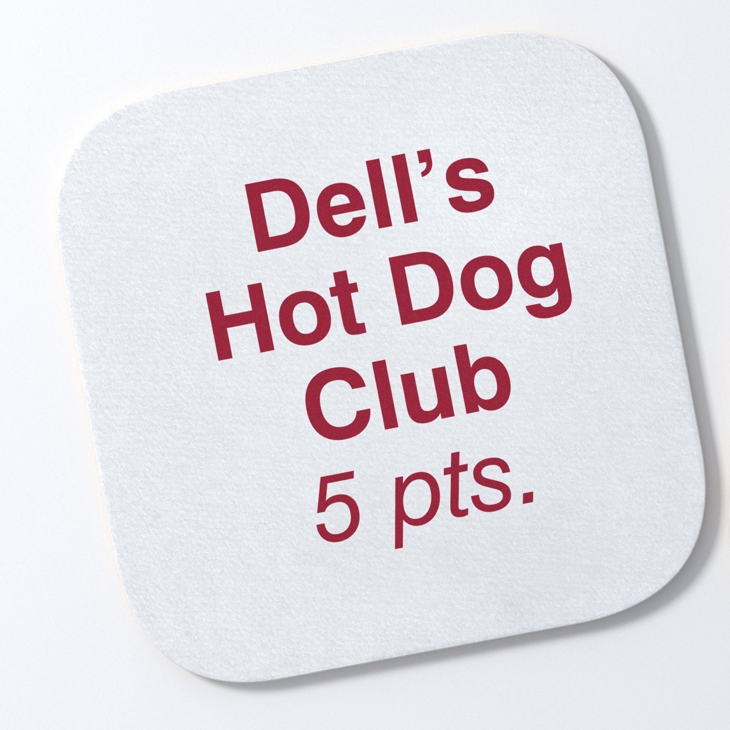 Custom Rubber Stamp Size 1 x 1 used to create a stamp on a white square paper with red text reading Dell's Hot Dog Club 5 pts.