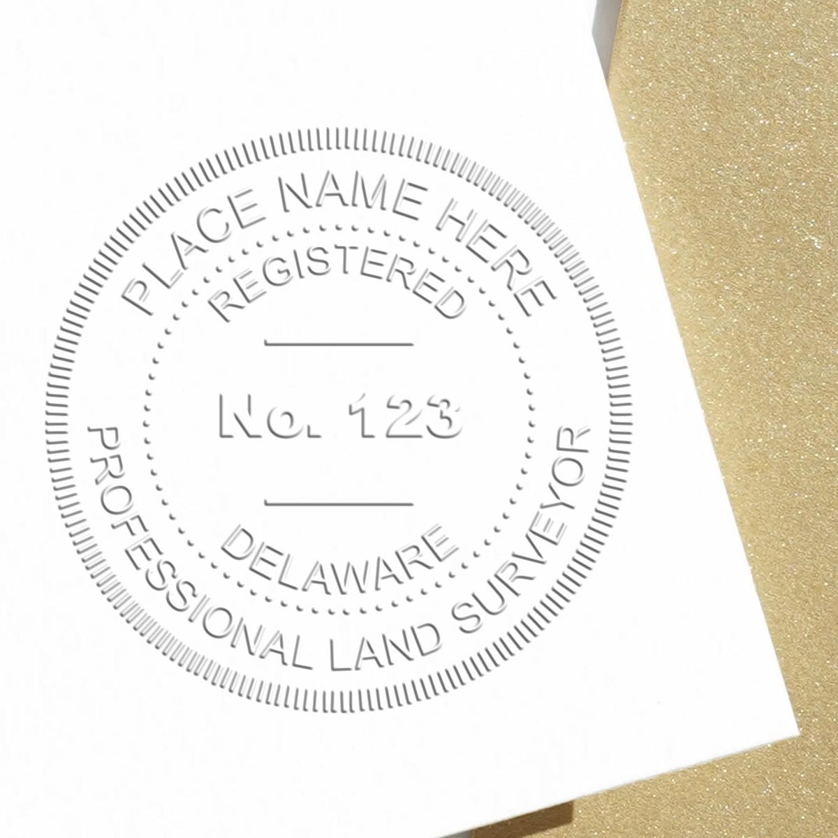 A photograph of the State of Delaware Soft Land Surveyor Embossing Seal stamp impression reveals a vivid, professional image of the on paper.