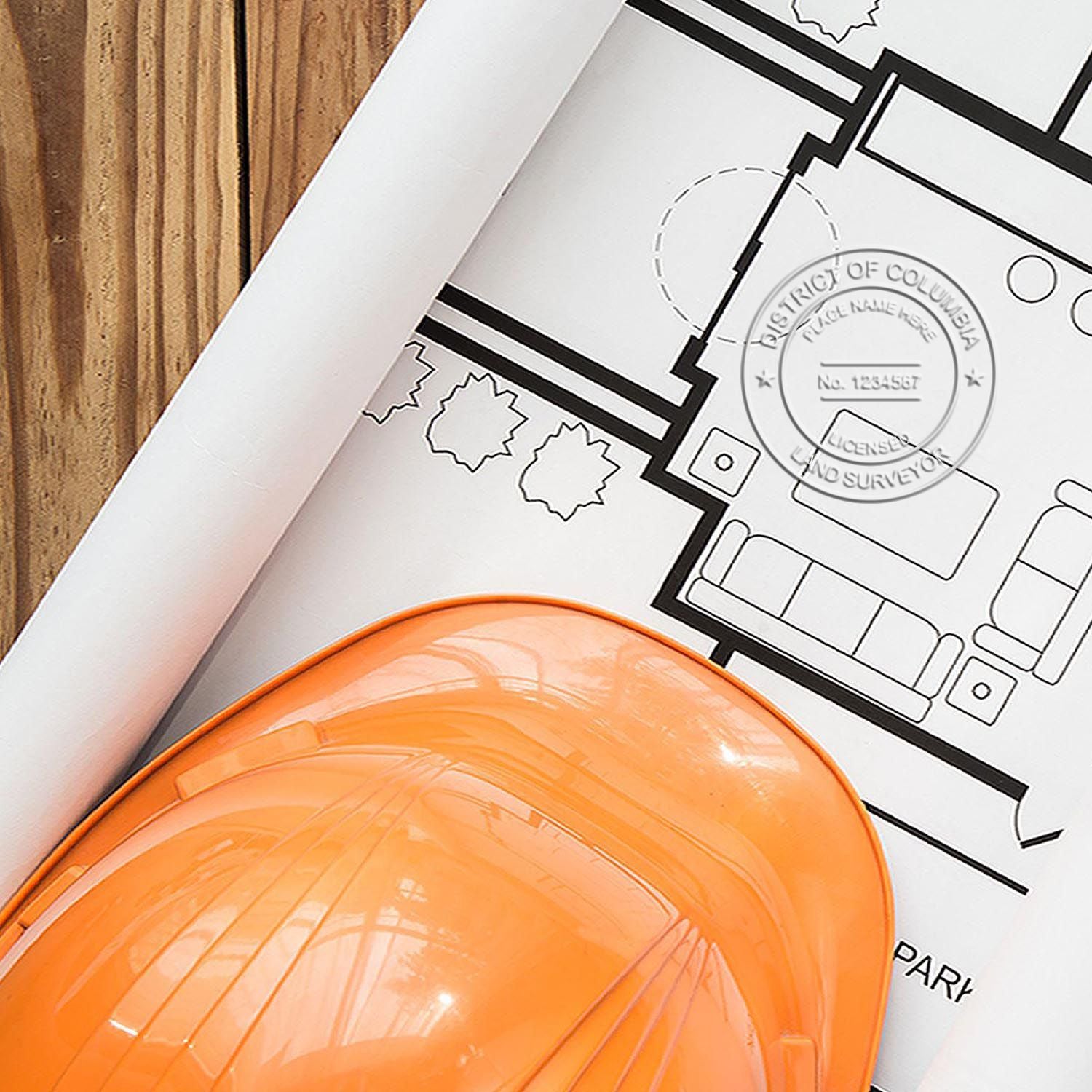 The Extended Long Reach District of Columbia Surveyor Embosser stamp impression comes to life with a crisp, detailed photo on paper - showcasing true professional quality.