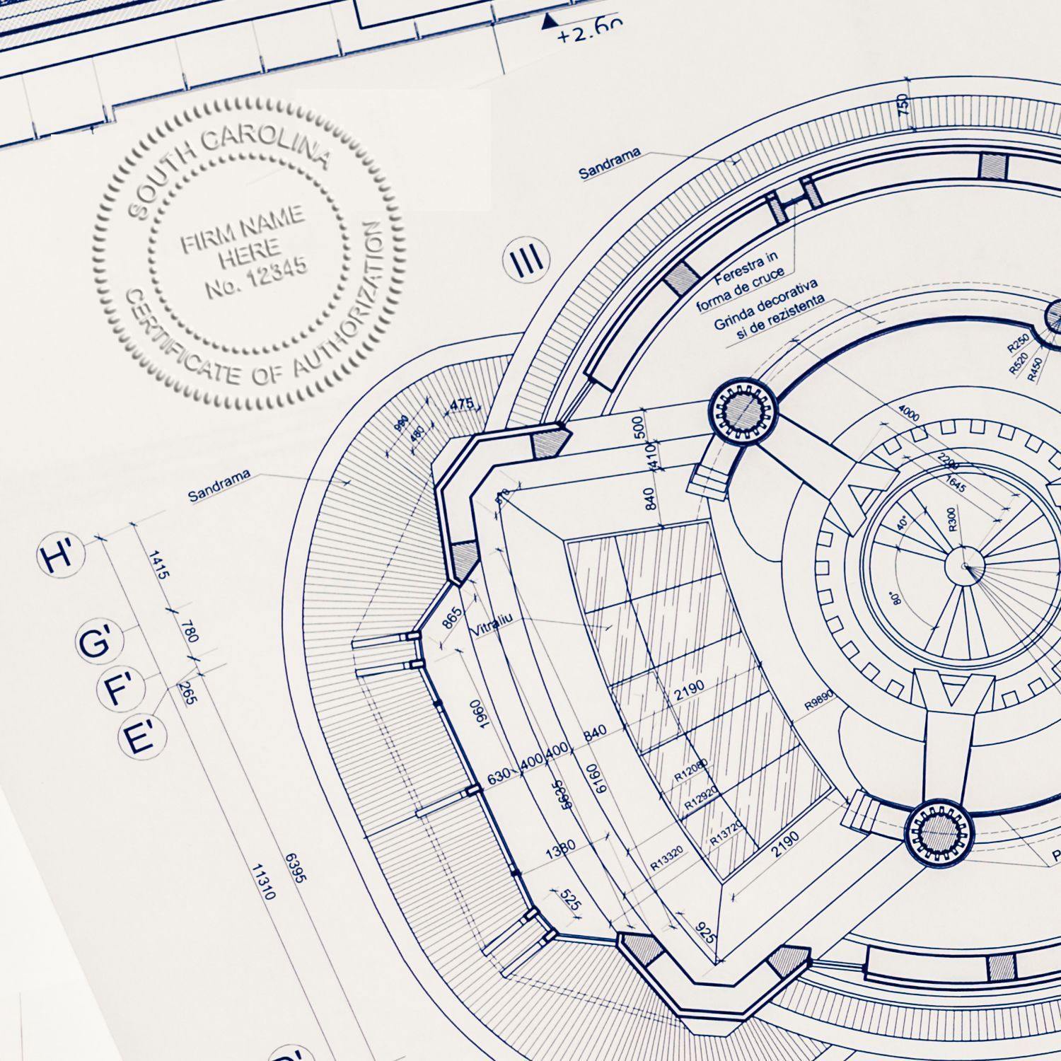 Professional Hybrid Seal Embosser in use, creating a detailed embossed seal on architectural blueprints with precise measurements and annotations.