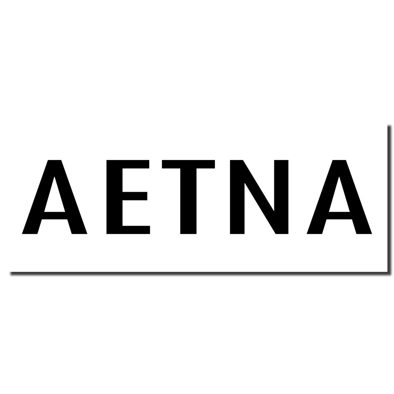 Medical Aetna Rubber Stamp with bold black letters spelling 'AETNA' on a white background.