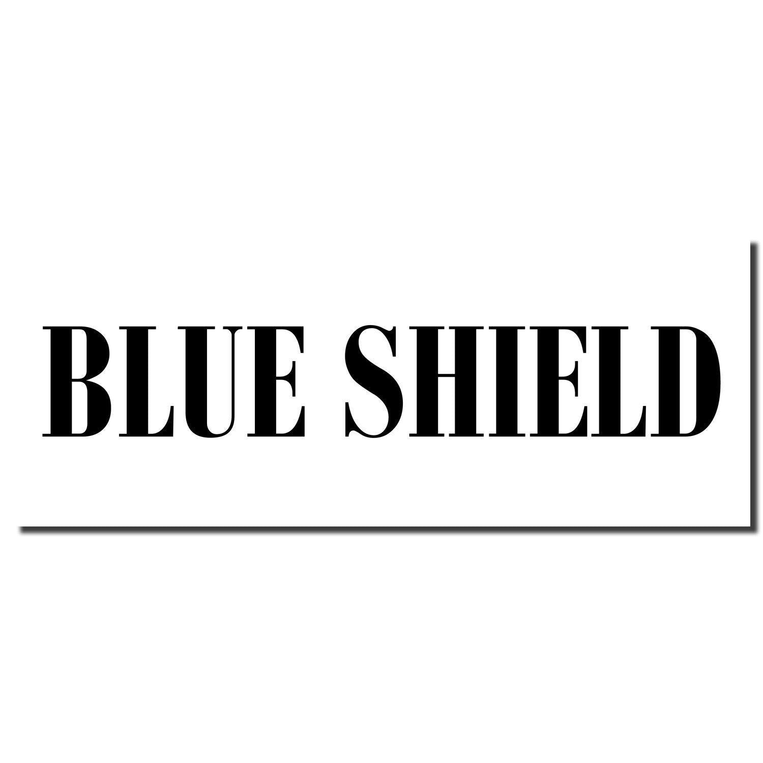 Slim Pre-Inked Blue Shield Stamp imprint showing bold, black text BLUE SHIELD on a white background.