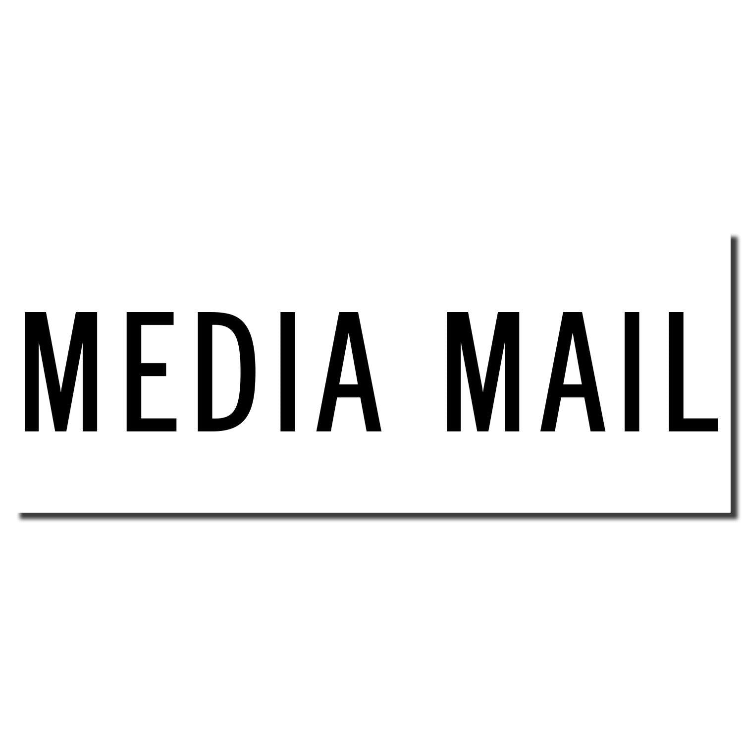 Image of a Large Media Mail Rubber Stamp imprint in black ink on a white background, displaying the text 'MEDIA MAIL' in bold capital letters.