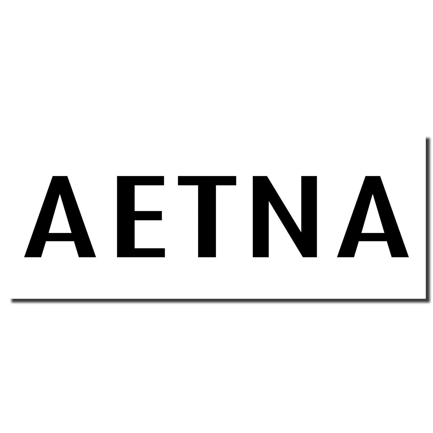 Image of a Large Self Inking Aetna Stamp imprint showing the word AETNA in bold black letters on a white background.