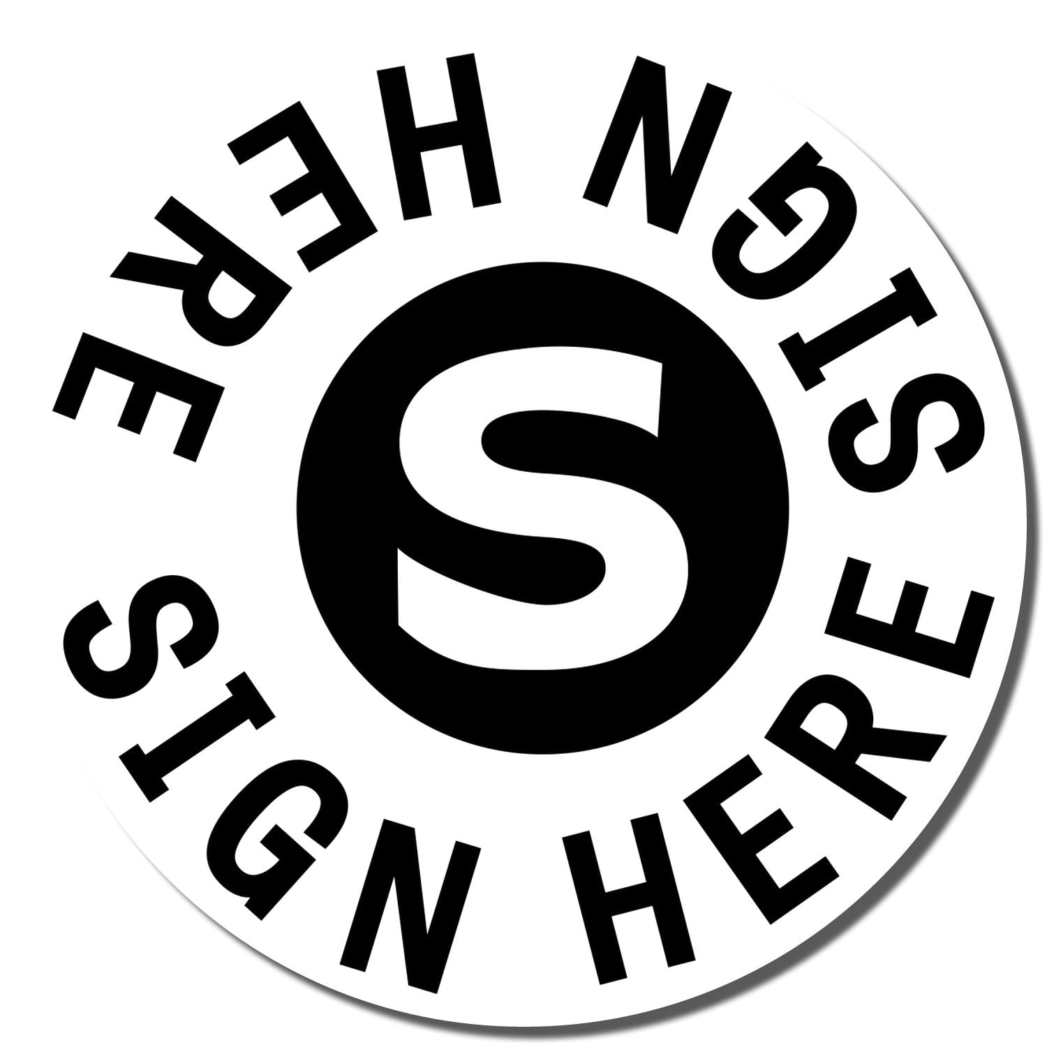 Self Inking Round Sign Here Sign Here Stamp with a bold S in the center and SIGN HERE text encircling it on a white background.