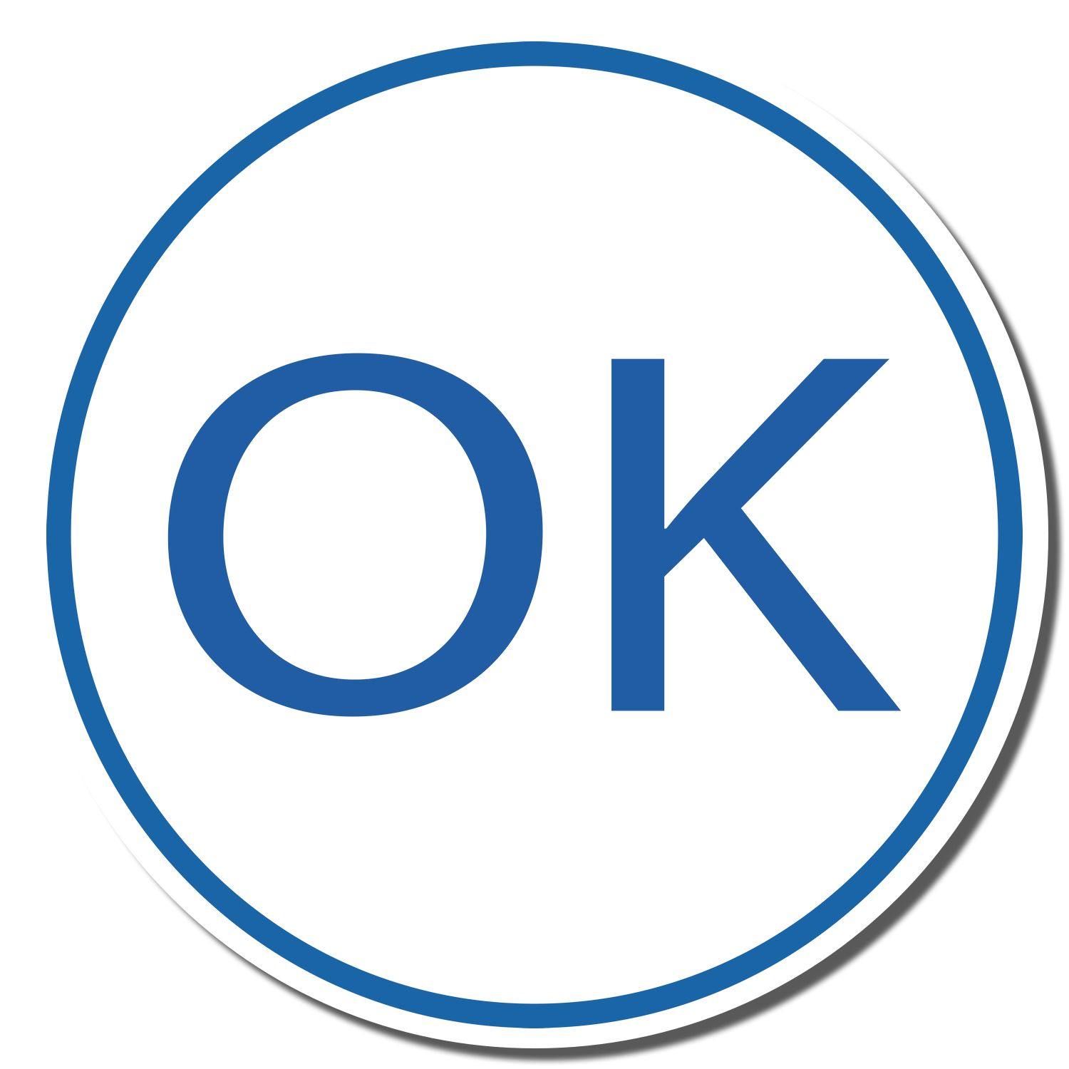 Round Ok Xstamper Stamp with a blue "OK" imprint inside a blue circle on a white background.