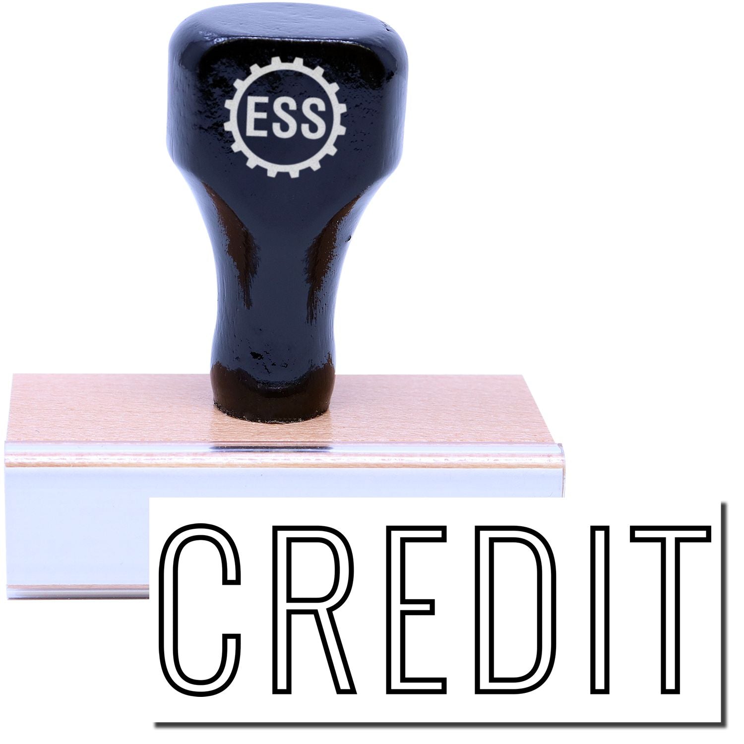 A stock office rubber stamp with a stamped image showing how the text "CREDIT" in an outline font is displayed after stamping.